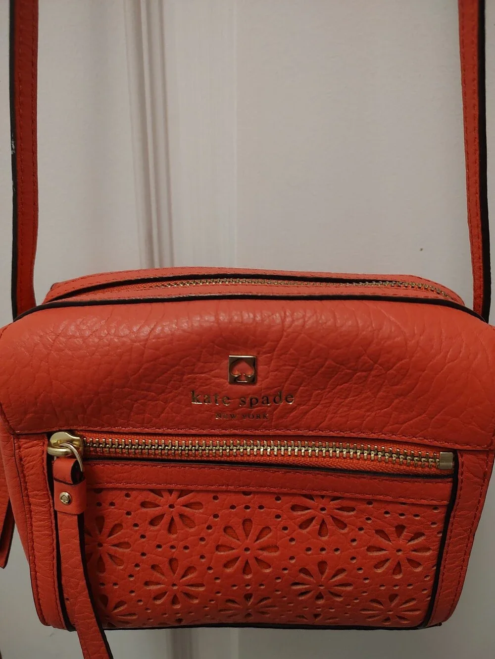 Kate Spade Coral Pink Leather Crossbody Bag with Floral Cutout